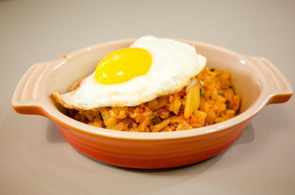 Kimchi Fried Rice with Egg in Ceramic Bowl