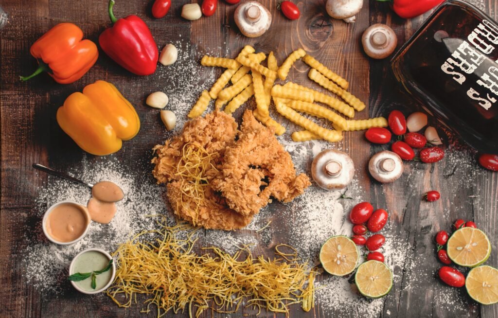 a-wooden-table-topped-with-different-types-of-food