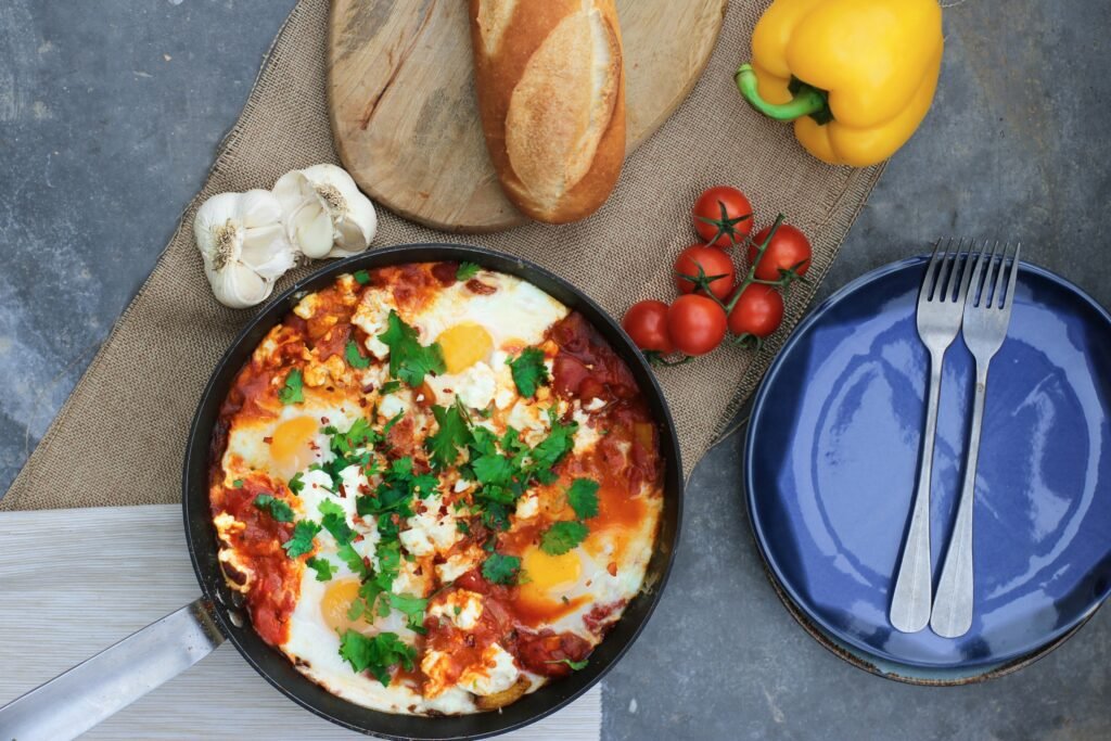 /steam-pasta-beside-tomatoes-and-plate-