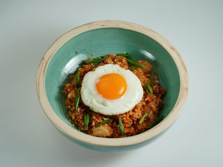 Close-up of a Bowl of Kimchi Fried Rice with an Egg